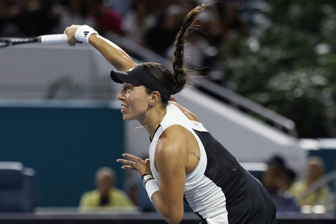 Mar 27, 2024; Miami Gardens, FL, USA; Jessica Pegula (USA) serves against Ekaterina Alexandrova (not pictured) on day ten of the Miami Open at Hard Rock Stadium. Mandatory Credit: Geoff Burke-USA TODAY Sports