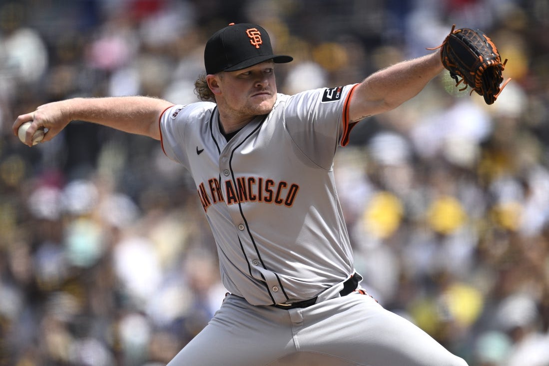 Mar 28, 2024; San Diego, California, USA; San Francisco Giants starting pitcher Logan Webb (62) throws a pitch against the San Diego Padres during the first inning at Petco Park. Mandatory Credit: Orlando Ramirez-USA TODAY Sports