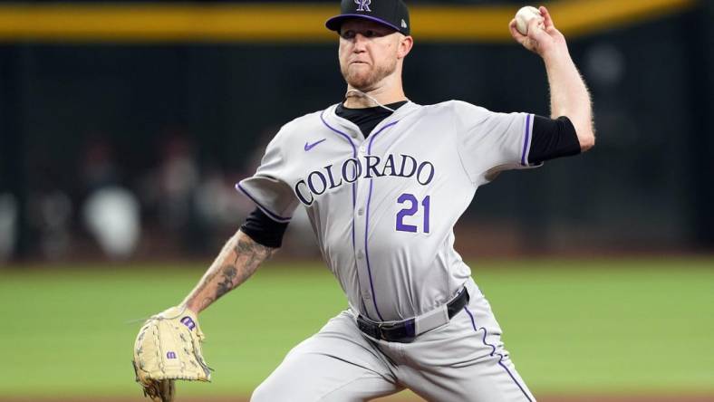 Mar 28, 2024; Phoenix, Arizona, USA; Colorado Rockies starting pitcher Kyle Freeland (21) pitches against the Arizona Diamondbacks during the first inning at Chase Field. Mandatory Credit: Joe Camporeale-USA TODAY Sports