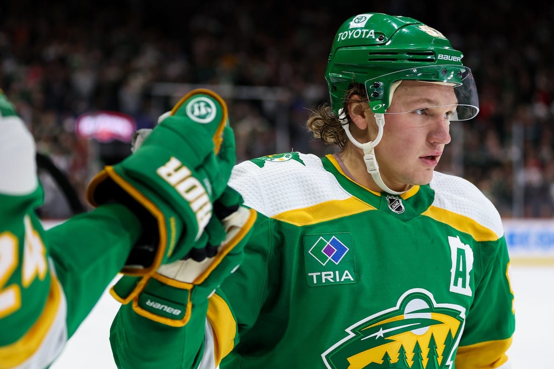 Mar 30, 2024; Saint Paul, Minnesota, USA; Minnesota Wild left wing Kirill Kaprizov (97) celebrates his power play goal against the Vegas Golden Knights during the second period at Xcel Energy Center. Mandatory Credit: Matt Krohn-USA TODAY Sports