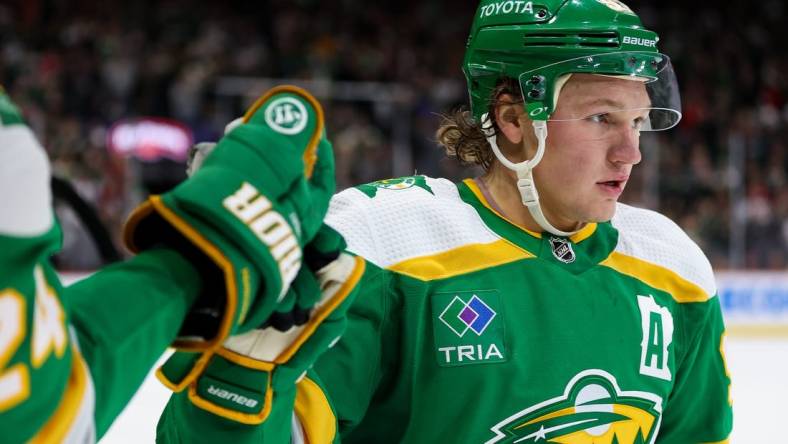 Mar 30, 2024; Saint Paul, Minnesota, USA; Minnesota Wild left wing Kirill Kaprizov (97) celebrates his power play goal against the Vegas Golden Knights during the second period at Xcel Energy Center. Mandatory Credit: Matt Krohn-USA TODAY Sports