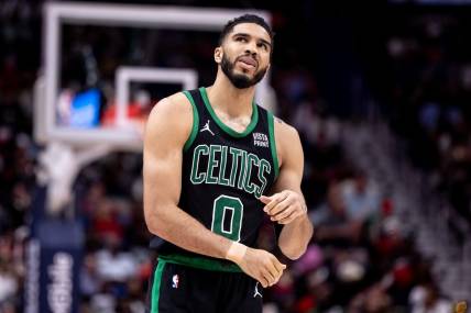 Mar 30, 2024; New Orleans, Louisiana, USA; Boston Celtics forward Jayson Tatum (0) looks on against the New Orleans Pelicans during the second half at Smoothie King Center. Mandatory Credit: Stephen Lew-USA TODAY Sports