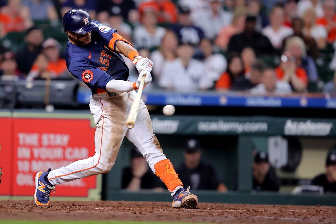 Mar 31, 2024; Houston, Texas, USA; Houston Astros shortstop Jeremy Pena (3) hits a single to right field against the New York Yankees during the ninth inning at Minute Maid Park. Mandatory Credit: Erik Williams-USA TODAY Sports