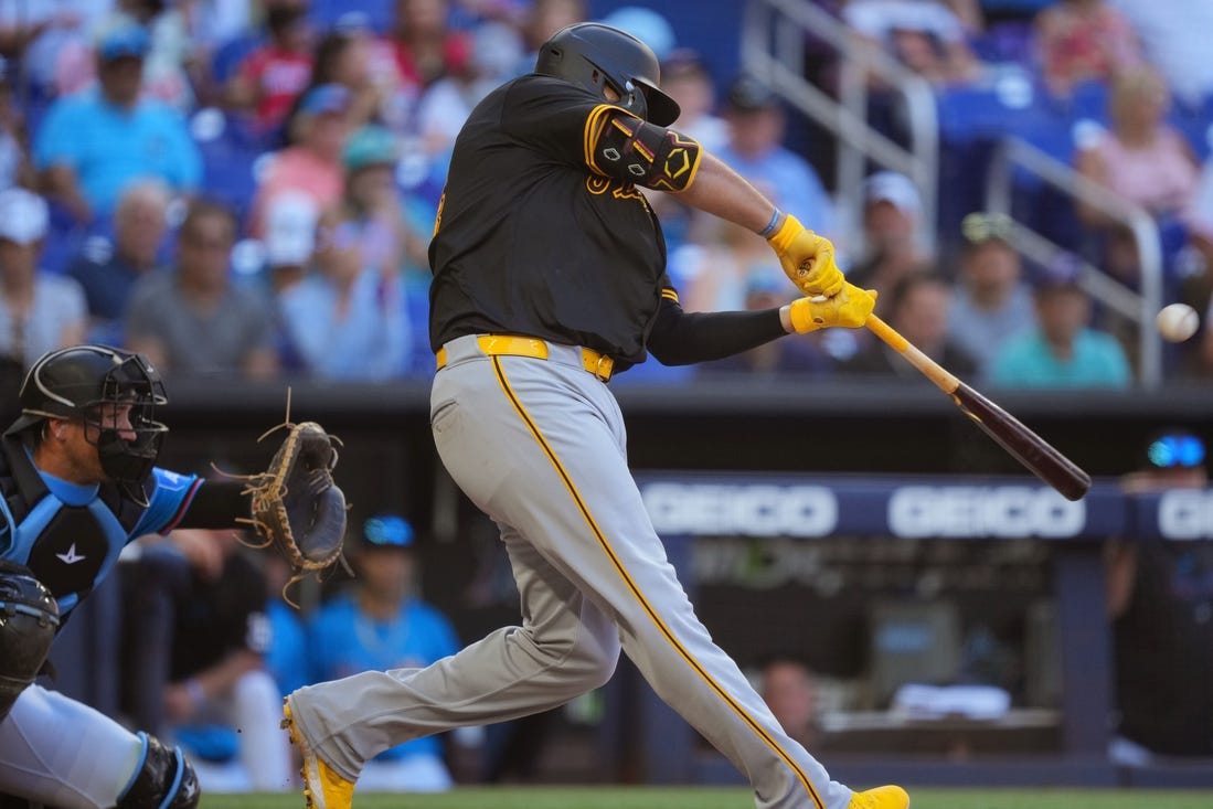 Mar 31, 2024; Miami, Florida, USA;  Pittsburgh Pirates first baseman Rowdy Tellez (44) hits a two-run home run in the seventh inning to give the Pirates the lead over the Miami Marlins at loanDepot Park. Mandatory Credit: Jim Rassol-USA TODAY Sports