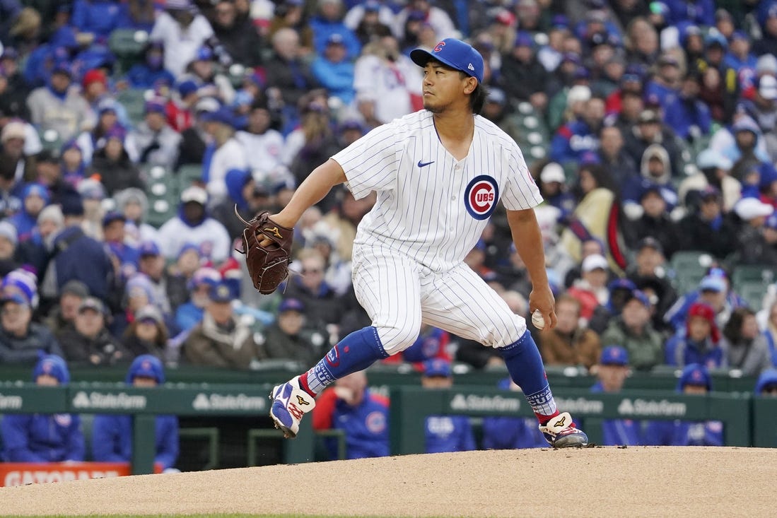 Apr 1, 2024; Chicago, Illinois, USA; Chicago Cubs starting pitcher Shota Imanaga (18) pitches against the Colorado Rockies during the first inning at Wrigley Field. Mandatory Credit: David Banks-USA TODAY Sports