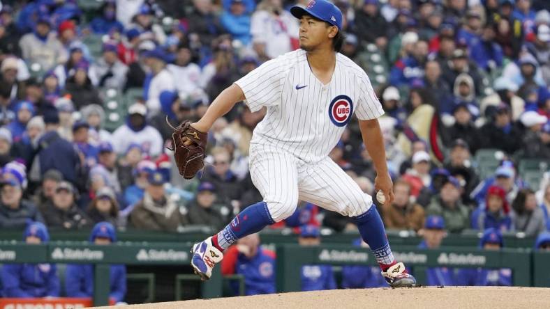 Apr 1, 2024; Chicago, Illinois, USA; Chicago Cubs starting pitcher Shota Imanaga (18) pitches against the Colorado Rockies during the first inning at Wrigley Field. Mandatory Credit: David Banks-USA TODAY Sports