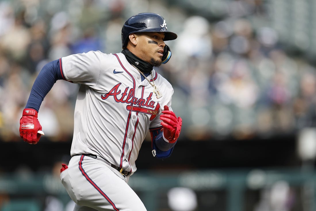Apr 1, 2024; Chicago, Illinois, USA; Atlanta Braves shortstop Orlando Arcia (11) runs to second base after hitting a two-run double against the Chicago White Sox during the fourth inning at Guaranteed Rate Field. Mandatory Credit: Kamil Krzaczynski-USA TODAY Sports