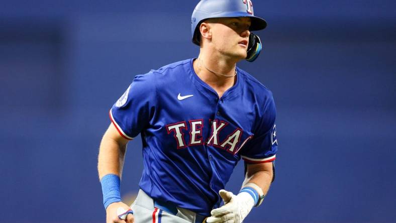 Apr 1, 2024; St. Petersburg, Florida, USA;  Texas Rangers third baseman Josh Jung (6) runs the bases after hitting a three run home run against the Tampa Bay Rays in the first inning at Tropicana Field. Mandatory Credit: Nathan Ray Seebeck-USA TODAY Sports