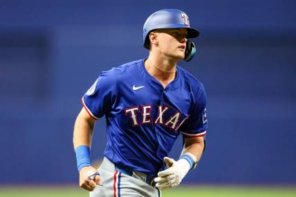 Apr 1, 2024; St. Petersburg, Florida, USA;  Texas Rangers third baseman Josh Jung (6) runs the bases after hitting a three run home run against the Tampa Bay Rays in the first inning at Tropicana Field. Mandatory Credit: Nathan Ray Seebeck-USA TODAY Sports