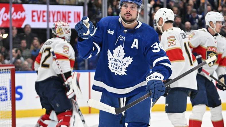 Apr 1, 2024; Toronto, Ontario, CAN; Toronto Maple Leafs forward Auston Matthews (34) celebrates after scoring a goal against the Florida Panthers in the first period at Scotiabank Arena. Mandatory Credit: Dan Hamilton-USA TODAY Sports