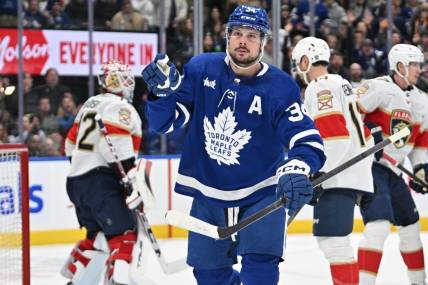 Apr 1, 2024; Toronto, Ontario, CAN; Toronto Maple Leafs forward Auston Matthews (34) celebrates after scoring a goal against the Florida Panthers in the first period at Scotiabank Arena. Mandatory Credit: Dan Hamilton-USA TODAY Sports