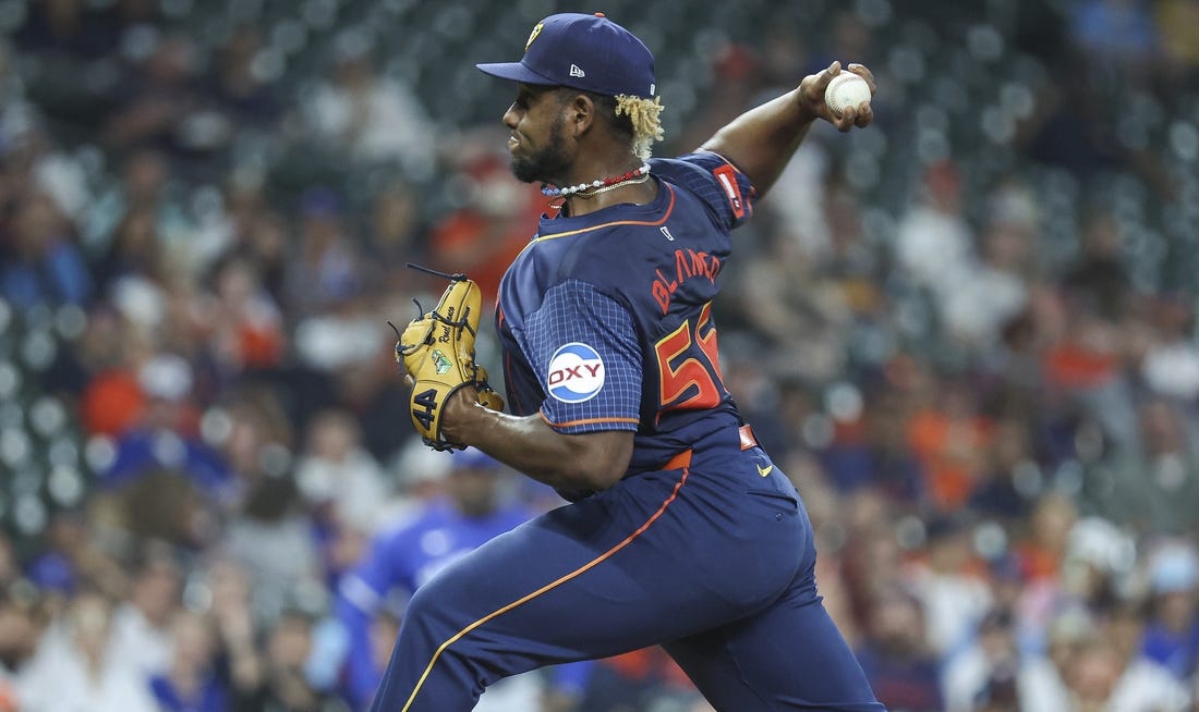 Apr 1, 2024; Houston, Texas, USA; Houston Astros starting pitcher Ronel Blanco (56) delivers a pitch during the first inning against the Toronto Blue Jays at Minute Maid Park. Mandatory Credit: Troy Taormina-USA TODAY Sports
