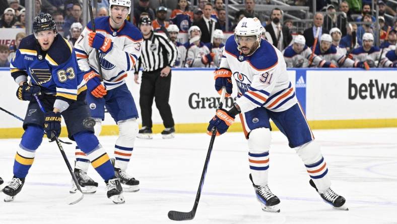 Apr 1, 2024; St. Louis, Missouri, USA; Edmonton Oilers left wing Evander Kane (91) skates against the St. Louis Blues during the first period at Enterprise Center. Mandatory Credit: Jeff Le-USA TODAY Sports