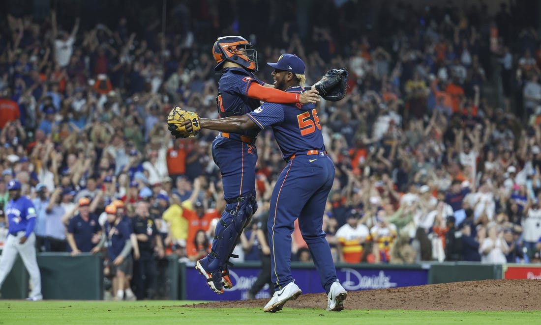 Apr 1, 2024; Houston, Texas, USA; Houston Astros starting pitcher Ronel Blanco (56) celebrates with catcher Yainer Diaz (21) after throwing a no-hitter against the Toronto Blue Jays at Minute Maid Park. Mandatory Credit: Troy Taormina-USA TODAY Sports
