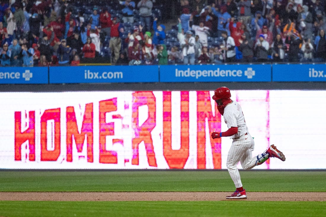Apr 2, 2024; Philadelphia, Pennsylvania, USA; Philadelphia Phillies first baseman Bryce Harper (3) runs the bases after hitting a home run during the first inning against the Cincinnati Reds at Citizens Bank Park. Mandatory Credit: Bill Streicher-USA TODAY Sports