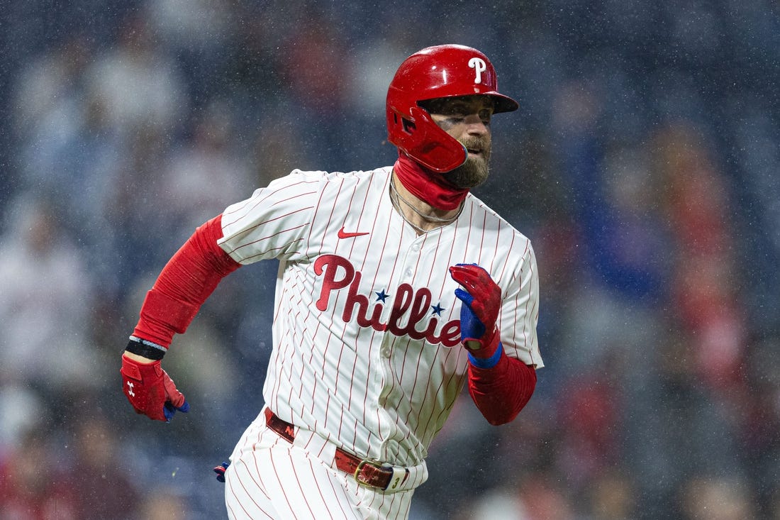 Apr 2, 2024; Philadelphia, Pennsylvania, USA; Philadelphia Phillies first baseman Bryce Harper (3) runs the bases after hitting his second home run of the game during the fourth inning against the Cincinnati Reds at Citizens Bank Park. Mandatory Credit: Bill Streicher-USA TODAY Sports