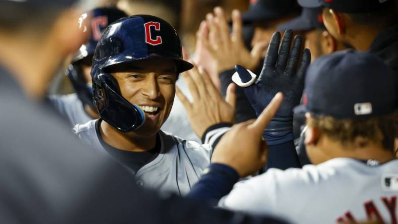 Apr 2, 2024; Seattle, Washington, USA; Cleveland Guardians designated hitter Bo Naylor (23) celebrates in the dugout after hitting a two-run home run against the Seattle Mariners during the fourth inning at T-Mobile Park. Mandatory Credit: Joe Nicholson-USA TODAY Sports