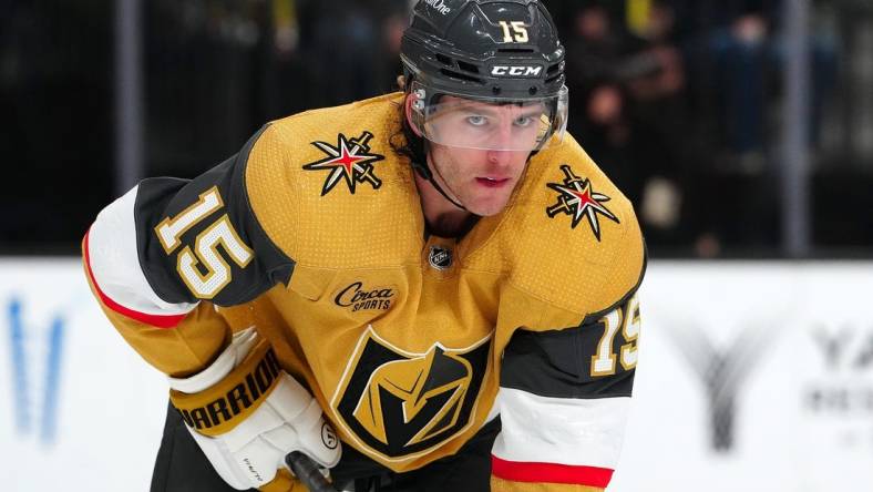 Apr 2, 2024; Las Vegas, Nevada, USA; Vegas Golden Knights defenseman Noah Hanifin (15) awaits a face off against the Vancouver Canucks during the second period at T-Mobile Arena. Mandatory Credit: Stephen R. Sylvanie-USA TODAY Sports