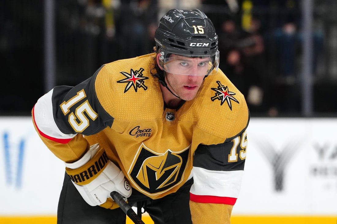 Apr 2, 2024; Las Vegas, Nevada, USA; Vegas Golden Knights defenseman Noah Hanifin (15) awaits a face off against the Vancouver Canucks during the second period at T-Mobile Arena. Mandatory Credit: Stephen R. Sylvanie-USA TODAY Sports