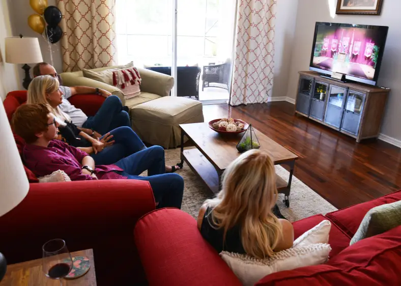 Syndication: Brevard || family watching streaming on tv