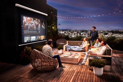 Friends on rooftop watching Sling TV