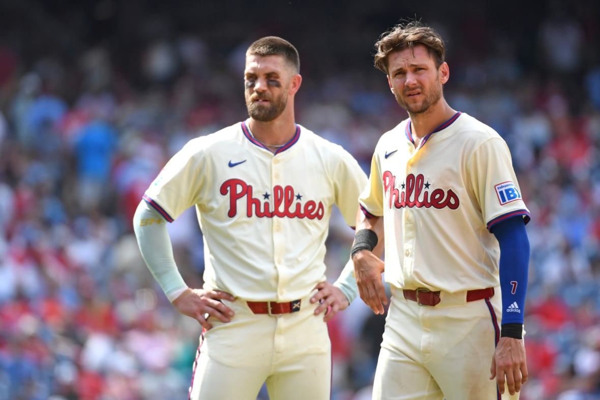 https://sportsnaut.com/wp-content/uploads/2025/10/Bryce-Harper-and-Trea-Turner-26796086-1180x787.jpg