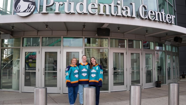 New York Sirens alternate captains Sarah Fillier and Jaime Bourbonnais with captain Micah Zandee-Hart.