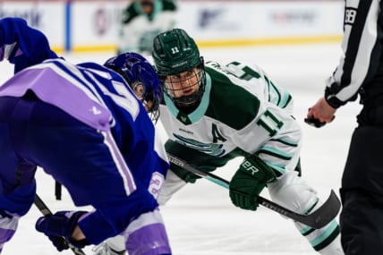 Boston Fleet forward Alina Müller takes a face-off against Minnesota Frost forward Taylor Heise.