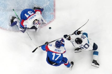 Olympics: Ice Hockey-Men Group B - SVK-FIN