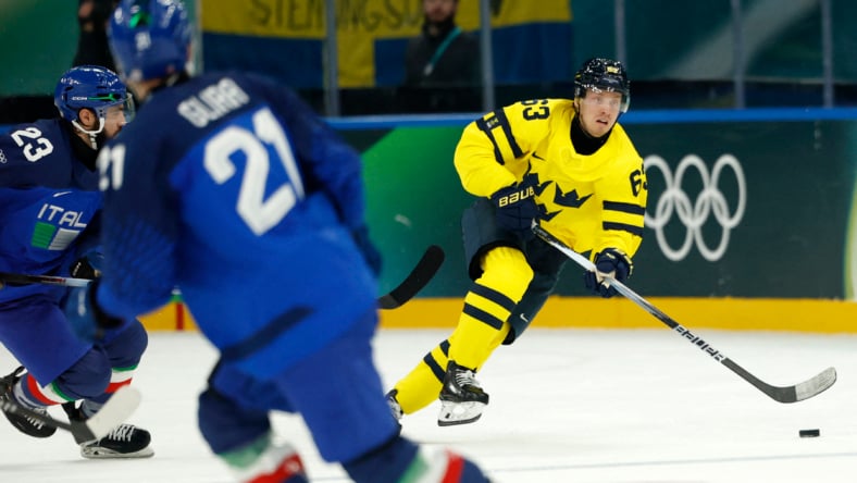 Olympics: Ice Hockey-Men Group B - SWE-ITA